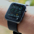 Image of the Life Watch screen with droplets of water on it, showcasing its waterproof feature.